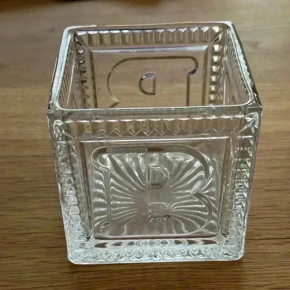 Decorative Glass Vase 3.5”x 4”, letters on outside spell BABY.